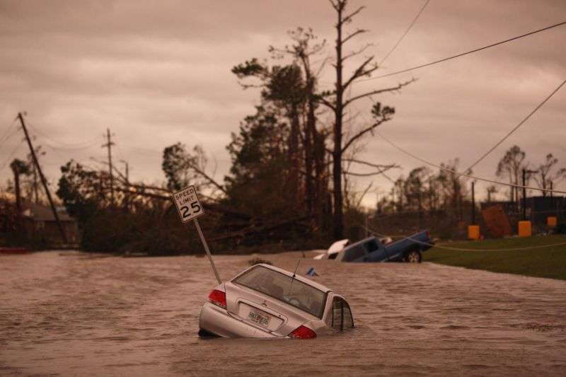 Vehicles sit partially submerged in floodwaters after Hurricane Michael hit in Panama City, Florida, U.S., on Wednesday, Oct. 10, 2018.