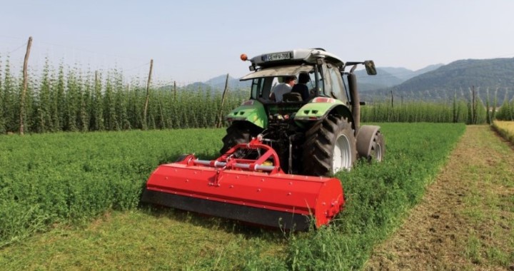 Field shredder is being run with a tractor PTO