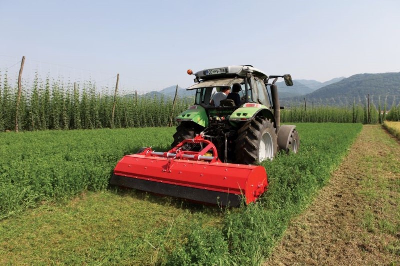 Field shredder is being run with a tractor PTO